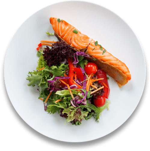 plate with delicious fish, vegetables and herbs