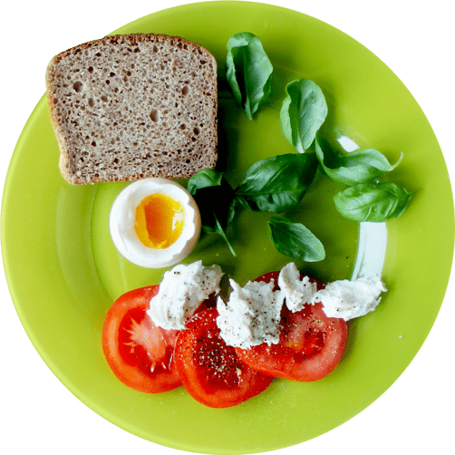 poached egg, black bread, tomatoes and herbs